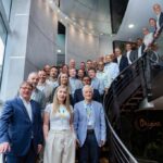 Grupo de participantes en el Teleforum 2026 en Luxemburgo, enfocados en telecomunicaciones.