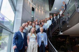 Grupo de participantes en el Teleforum 2026 en Luxemburgo, enfocados en telecomunicaciones.