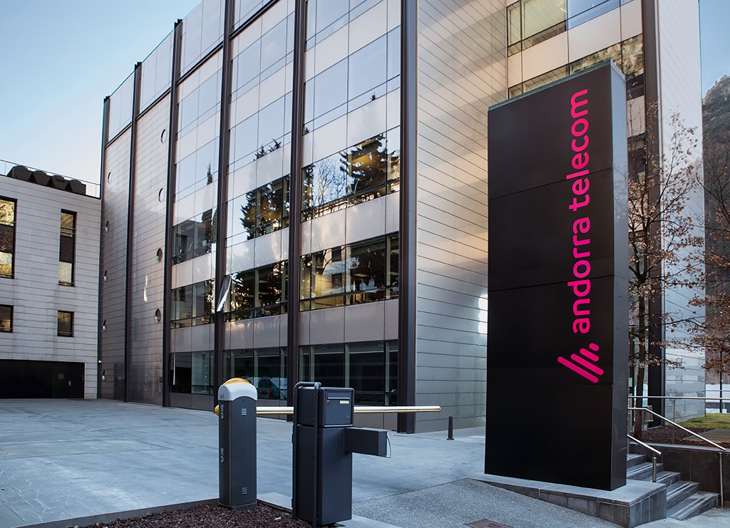 Edificio moderno de Andorra Telecom con logo visible en la entrada.